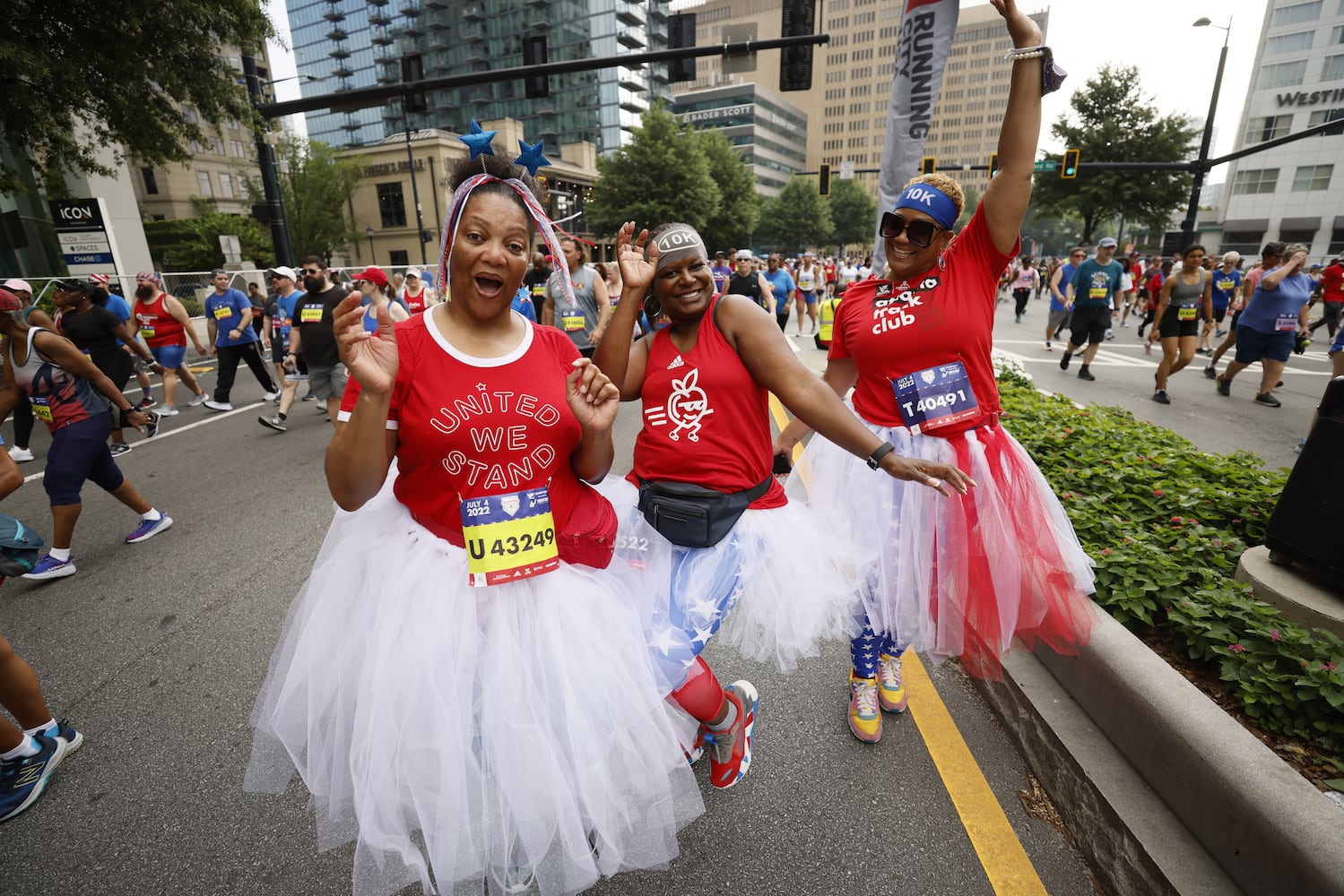 Runners in the 53rd running of the Atlanta Journal-Constitution Peachtree Road Race in Atlanta on Sunday, July 3, 2022. (Miguel Martinez / Miguel.Martinezjimenez@ajc.com)