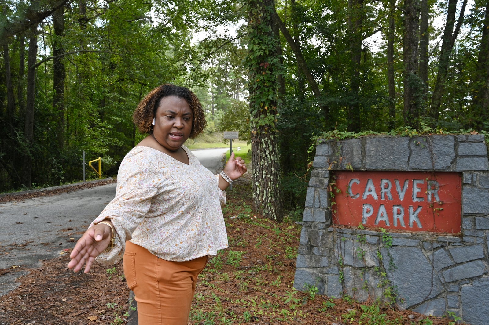 Columbus City councilwoman Toyia Tucker expresses her concerns at Carver Park in Columbus. To try to cut down on the after-dark violence, Tucker pushed in February to get the city to start closing the park at 7 p.m. More recently, the city closed the park on weekends until additional safety measures can be implemented, such as more cameras. (Hyosub Shin / Hyosub.Shin@ajc.com)