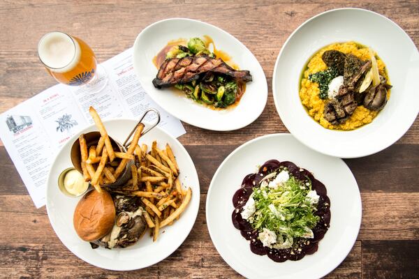 BoxCar (clockwise from bottom left) The Big Bleu Bison Burger, Bacon and Brussels, Lamb and Pumpkin Polenta, and Roasted Beet Carpaccio. Photo credit- Mia Yakel.