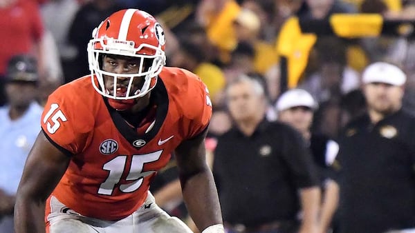 Georgia outside linebacker D'Andre Walker (15) leads the Bulldogs with 7-1/2 sacks this season.