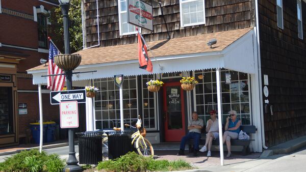 Visitors to Lewes stop in the charming downtown area to enjoy a treat at the local ice cream shop. (Myscha Theriault/TNS)