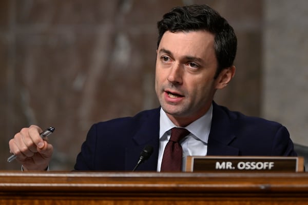 Sen. Jon Ossoff, D-Ga., questions John Ratcliffe, President-elect Donald Trump's choice to be the Director of the Central Intelligence Agency, appearing before the Senate Intelligence Committee for his confirmation hearing, at the Capitol in Washington, Wednesday, Jan. 15, 2025. (AP Photo/John McDonnell)