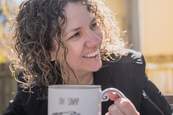 Burger contest winner Lauren Holley enjoys a cup of coffee at her home in the Old Fourth Ward. Courtesy of Lauren Holley