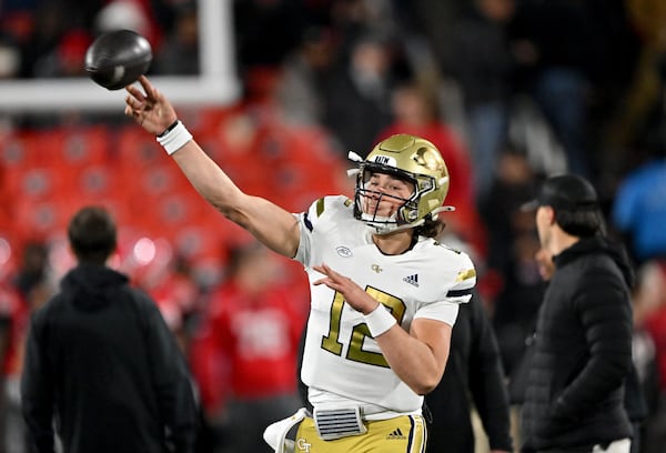 Georgia Tech quarterback Aaron Philo (12) throw a ball before an NCAA football game between Georgia and Georgia Tech at Sanford Stadium, Friday, November 29, 2024, in Athens. (Hyosub Shin / AJC)