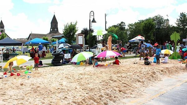 Oak Road in Snellville will be transformed with 70 tons of soft sand this Saturday at the Beach Bash.