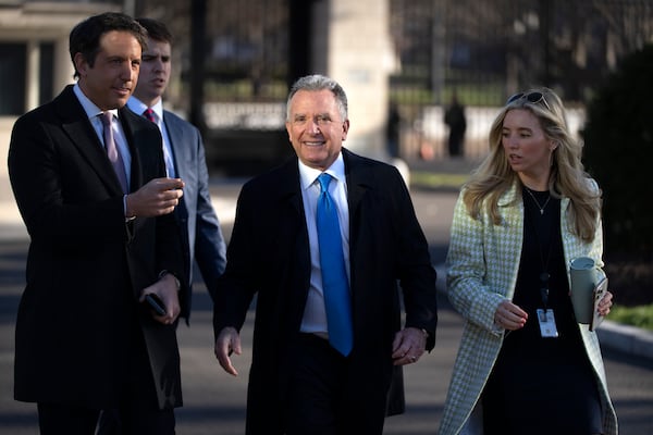 Steve Witkoff, left, White House special envoy, walks toward the Oval Office at the White House, Wednesday, March 19, 2025, in Washington. (AP Photo/Mark Schiefelbein)