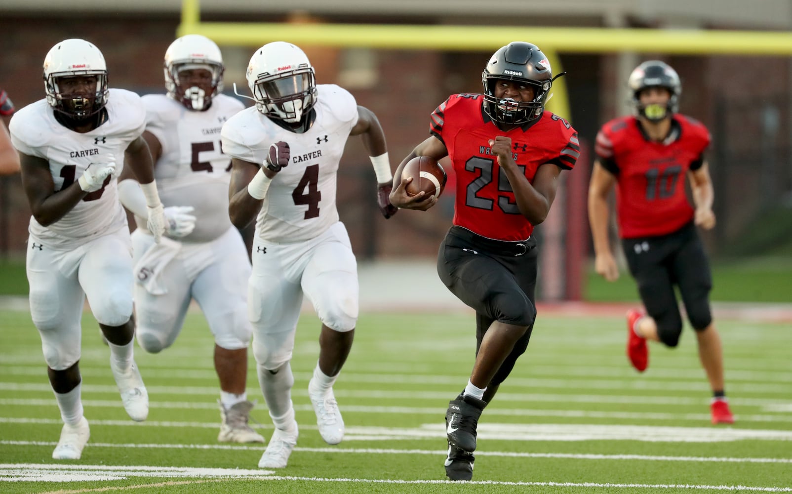 Cherokee running back Zi Johnson (25) runs for yards in the third quarter against Carver-Atlanta at Cherokee high school Wednesday, September 2, 2020 in Canton, Ga.. JASON GETZ FOR THE ATLANTA JOURNAL-CONSTITUTION