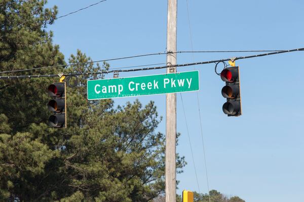 12/29/2017 -- East Point, GA, - A Camp Creek Parkway sign hangs at the intersection of Interstate 285 in East Point, Friday, December 29, 2017.  ALYSSA POINTER/ALYSSA.POINTER@AJC.COM