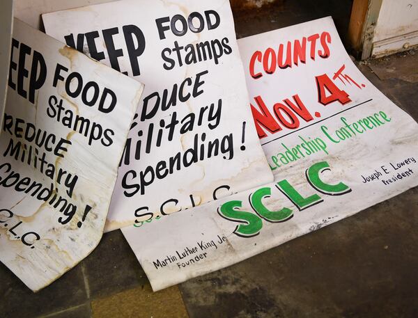 Posters are seen in the basement of the The Prince Hall Masonic Lodge on Auburn Avenue, Monday, Nov 8, 2021. (Daniel Varnado/For The Atlanta Journal Constitution)