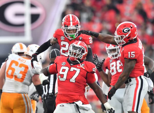 November 5, 2022 Athens - Georgia's defensive lineman Warren Brinson (97) celebrates with teammates during the second half in an NCAA football game at Sanford Stadium in Athens on Saturday, November 5, 2022. Georgia won 27-13 over Tennessee. (Hyosub Shin / Hyosub.Shin@ajc.com)