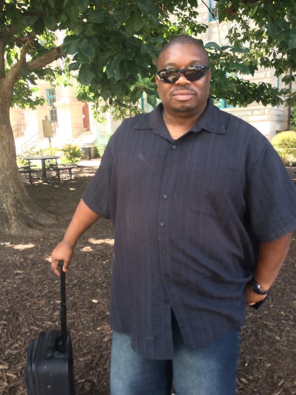 James Parham, a veteran, has mixed feelings about Confederate monuments, including the one outside the old DeKalb County courthouse. Removing them “is not going to cure racism,” he said. (Photo by Bill Torpy)