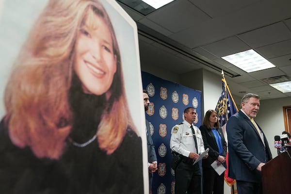 A photo of UGA law student Tara Louise Baker is seen as Chris Hosey, Director of the Georgia Bureau of Investigation, speaks during a press conference announcing an arrest in the student's 23-year-old cold case death on Monday, May 13, 2024, in Decatur. (Elijah Nouvelage for The Atlanta Journal-Constitution)