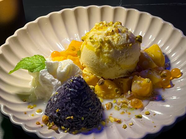 Sticky rice with mango ice cream is a dessert offering at Bar of Thailand. Henri Hollis/henri.hollis@ajc.com