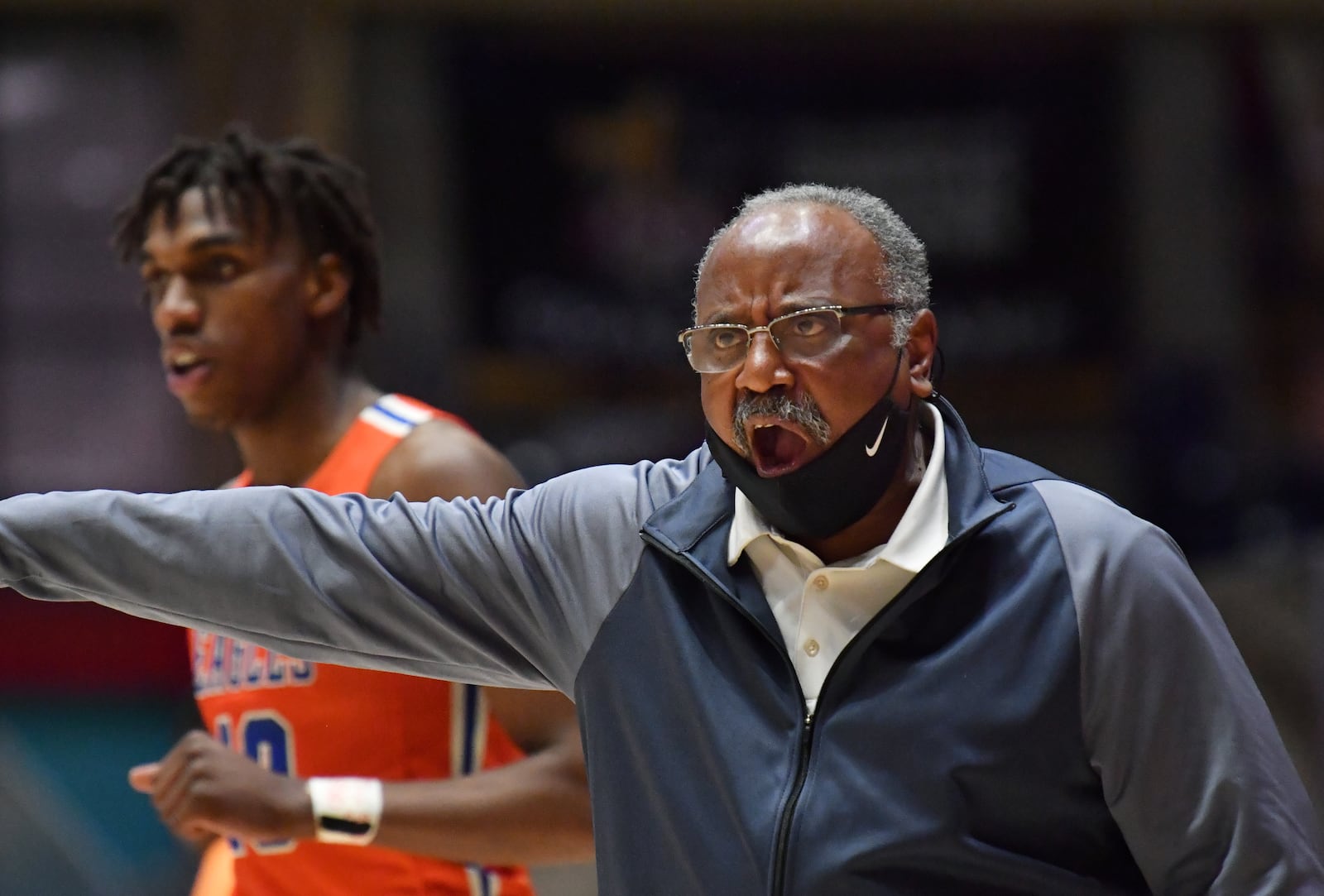 Columbia head coach Phil McCrary instructs his players during the Class 2A boys title game Thursday, March 11, 2021, in Macon, Columbia lost to Pace Academy, 73-42. (Hyosub Shin / Hyosub.Shin@ajc.com)