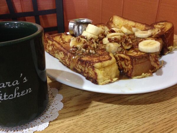 The Banana Fosters French Toast and coffee at Sara's Kitchen  is the perfect way to start your day. (Meghan Faiella / The Palm Beach Post)