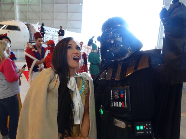 Margaret Ussery as Pocahontas buddies up with Darth Vader. CREDIT: Rodney Ho/ rho@ajc.com