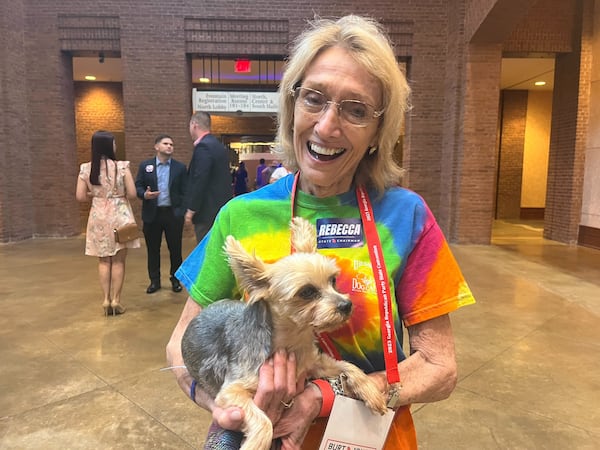 Jane Heivilin is seen with her 10-year-old Yorkie Trouble at the GOP convention in Columbus on Saturday, June 10, 2023.