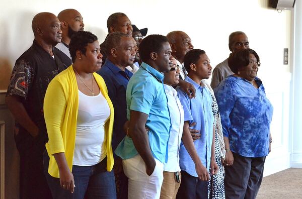  Family, friends and supporters of Anthony Gray pause for a quick snapshot outside the courtroom and just minutes after hearing Gray would be released from prison  after serving more than 15 years of a 30 year sentence.(Chris Hunt/Special) 