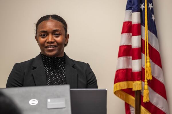 Darian Burns, a legislative and public policy analyst at the Southern Education Foundation, speaks at the Georgia Professional Standards Commission meeting on Thursday, July 13, 2023, to oppose wording changes in teacher preparation rules. (Katelyn Myrick/katelyn.myrick@ajc.com)