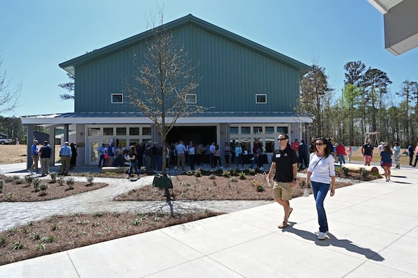 The exterior of the gym on the West Campus of Camp Twin Lakes. For 30 years, Georgia children with serious illnesses, disabilities and other challenges have had access to a full camp experience at Camp Twin Lakes. On Thursday, the camp celebrated a $25 million expansion that will allow 3,500 more campers to attend each year, including some whom the camp was previously unable to serve. (Hyosub Shin / Hyosub.Shin@ajc.com)