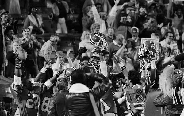 A "Big Ben" desperation pass caught by Willy "White Shoes" Johnson gave the Atlanta Falcons a victory over the San Francisco 49ers and a ride atop teammates' shoulders for Johnson in Atlanta, Nov. 21, 1983. The pass from Steve Bartkowski in the final two seconds won, 28-24. (Charles Kelly/AP)