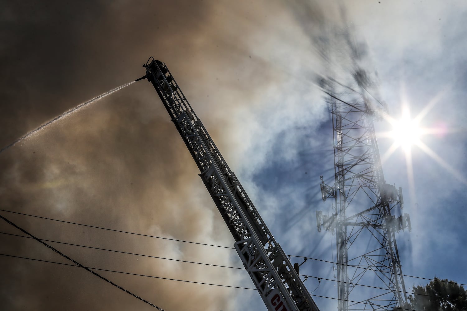 A raging fire at the Buckhead Saloon on Monday morning shut down a portion of Roswell Road for several hours.
