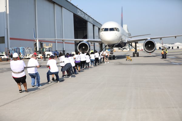 After a two-year hiatus, Delta Air Lines, in partnership with the American Cancer Society, brought back the Jet Drag event on Wednesday, May 4. 2022. The fundraiser event attracted a hundred and fifty teams from Delta employees worldwide to pull a 757 in the quickest amount of time. Miguel Martinez /miguel.martinezjimenez@ajc.com