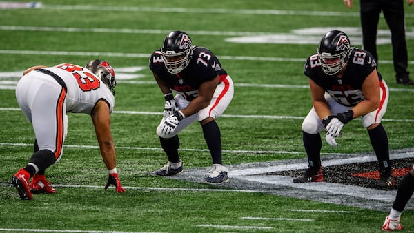 Atlanta Falcons offensive tackle Matt Gono (73) and offensive guard Chris Lindstrom (63) line up against Tampa Bay Buccaneers defensive end Ndamukong Suh (93) during the first half Sunday, Dec. 20, 2020, at Mercedes-Benz Stadium in Atlanta. The Buccaneers won 31-27. (Danny Karnik/AP)