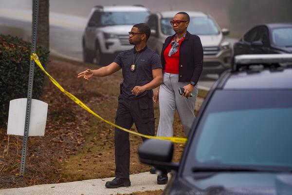 Police investigate after two men were found dead in a South Fulton neighborhood Wednesday.