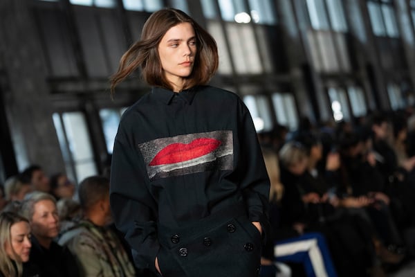 A model wears a creation as part of the Sacai Fall/Winter 2025-2026 Womenswear collection presented in Paris, Monday, March 10, 2025. (Photo by Scott A Garfitt/Invision/AP)