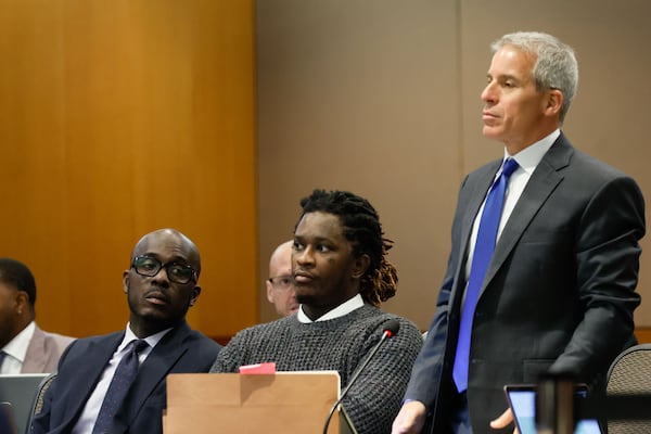 Young Thug, whose real name is Jeffery Williams, and his lawyer, Brian Steel, look on during the rapper's trial on Monday, June 10, 2024.
(Miguel Martinez / AJC)