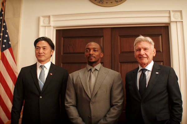 Takehiro Hira (from left), Anthony Mackie and Harrison Ford filmed a scene for Marvel Studios' "Captain America: Brave New World" at the replica White House on the backlot of Tyler Perry Studios in Atlanta. (Marvel Studios-Disney via AP)