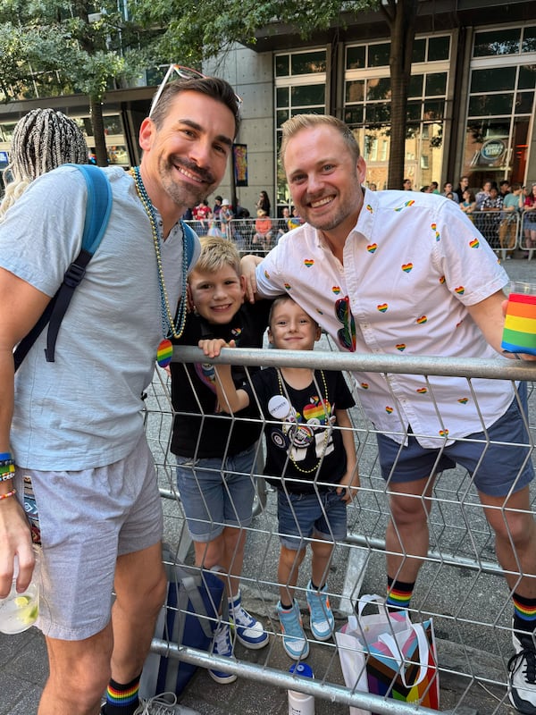 Doug Munster and his husband of 17 years attended the pride parade with their two sons, ages nine and six. They run a nonprofit to help Georgia families adopt children.