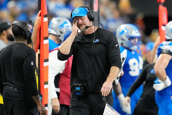 Detroit Lions head coach Dan Campbell reacts against the Chicago Bears during the second half of an NFL football game in Detroit, Thursday, Nov. 28, 2024. (AP Photo/Carlos Osorio)