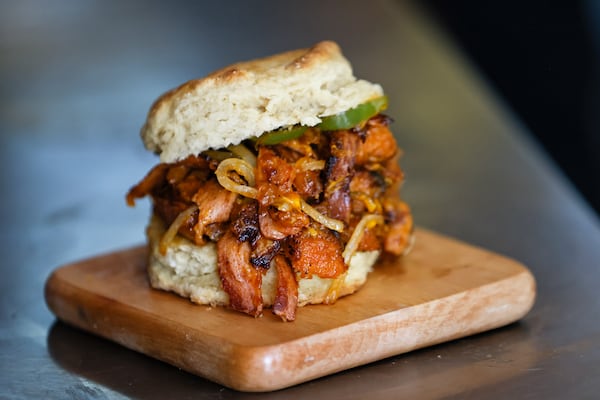 The Slap Ya Mama Chik’n Biscuit is a staple on the menu of Gregory’s Atlanta Vegan Breakfast. (Natrice Miller / natrice.miller@ajc.com)