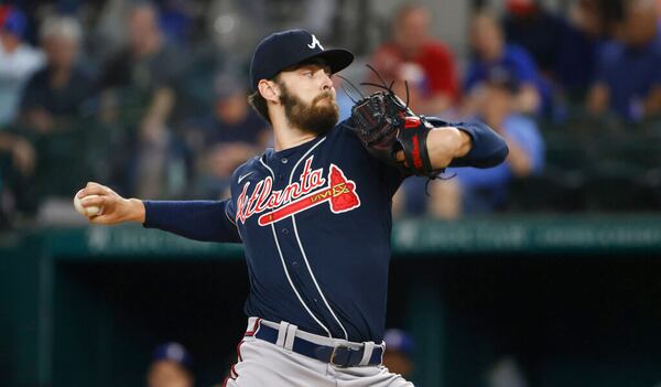 Atlanta Braves starting pitcher Ian Anderson throws against the Texas Rangers during the first inning of a baseball game Friday, April 29, 2022, in Arlington, Texas. (AP Photo/Ron Jenkins)