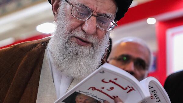 Iran's supreme leader Ayatollah Ali Khamenei was photographed browsing a Farsi copy of the book, "Fire and Fury" by Michael Wolff at the 2018 Tehran International Book Fair, according to a post on his website.