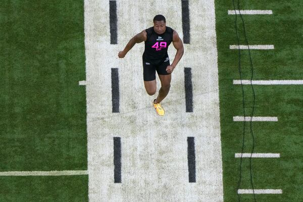 Kansas State defensive back Marques Sigle runs in the 40-yard dash at the NFL football scouting combine, Friday, Feb. 28, 2025, in Indianapolis. (AP Photo/Charlie Riedel)