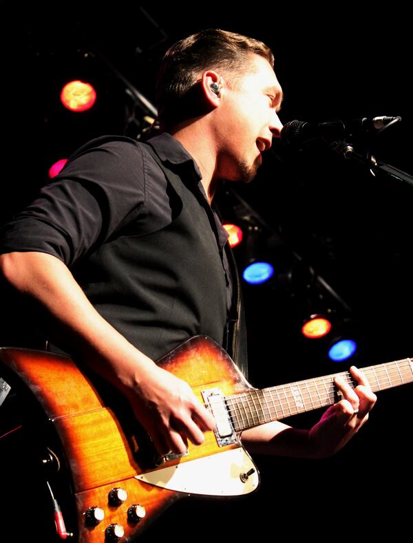 Isaac stole the spotlight with his robust guitar playing. Photo: Melissa Ruggieri/AJC.