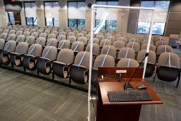 A presentation room in the Bill Moore Student Success Center at Georgia Tech has been converted from a 140-person theater to a 29-student classroom. Because the podium is not quite far enough away from the seats, an acrylic partition has been added for the instructor. BEN GRAY FOR THE ATLANTA JOURNAL-CONSTITUTION