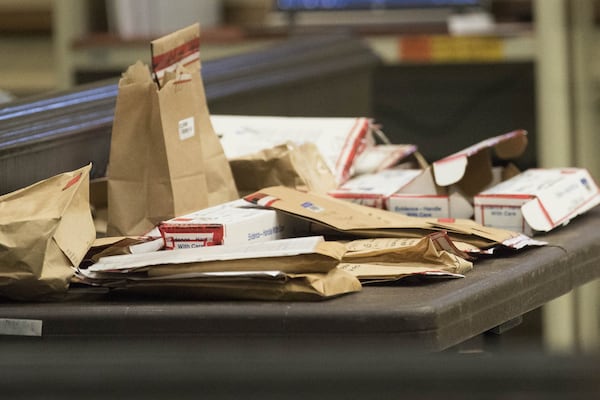 06/22/2018 — Griffin, GA - Piles of evidence are displayed on a table inside the courtroom during the murder trial of Franklin Gebhardt. ALYSSA POINTER/ALYSSA.POINTER@AJC.COM