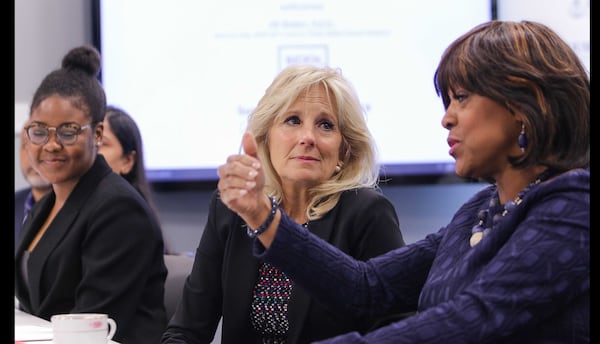 Jill Biden, center, listens as Morehouse School of Medicine President Dr. Valerie Montgomery Rice discusses cancer research during Biden's March 31, 2019 visit to the campus. PHOTO CREDIT: MOREHOUSE SCHOOL OF MEDICINE.