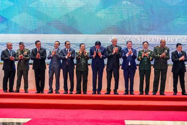 From left, Brunei's Defense Minister II Halbi bin Haji Mohd Yussof, Cambodian Defense Minister Tea Seiha, Indonesian Vice Defense Minister Donny Ermawan Taufanto, Myanmar's director of Defense Ministry's International Affairs Department Zaw Naing Win, Malaysian Defense Minister Mohamed Khaled Nordin, Laos' Defense Minister Chansamone Chanyalath, Philippine Defense Undersecretary Ignacio Florante Madriaga, Singaporean Defense Minister Ng Eng Hen, Thai Defense Minister Phumtham Wechayachai, Vietnamese Defense Minister Phan Van Giang, East Timor Chief of Defense Force Domigos Raul and ASEAN Secretary General Kao Kim Hourn pose for a group photo during the Association of Southeast Asian Nations (ASEAN) defense ministers' meeting in Vientiane, Laos, Wednesday, Nov. 20, 2024. (AP Photo/Anupam Nath)