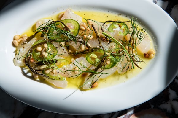 The pink snapper crudo at Pendolino comes with the added flavors of citrus, sea fennel, pine nuts and jalapeno. Courtesy of Cassie Wright