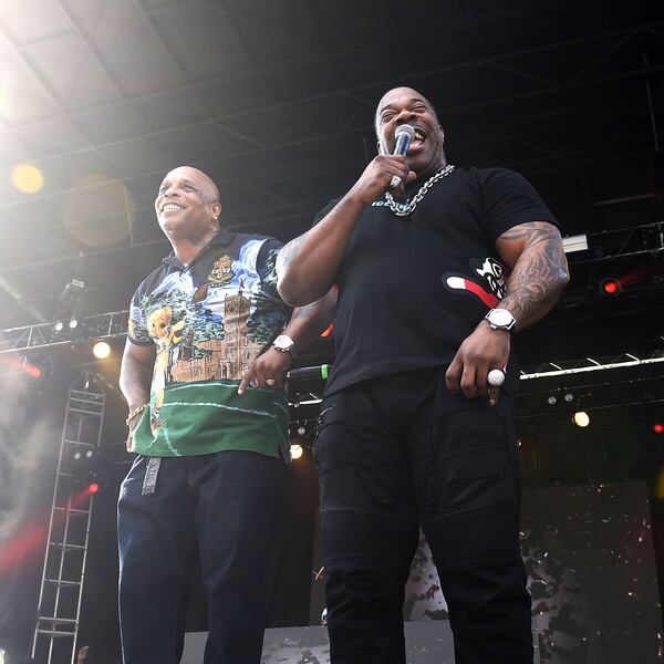 Rapper Busta Rhymes (right) and hype man Spliff Star perform at One Musicfest Saturday. One Musicfest is celebrating its 10th anniversary at Centennial Park. Day one kicked off with headliners Gucci Mane and Academy Award winners Three 6 Mafia. RYON HORNE/RHORNE@AJC.COM