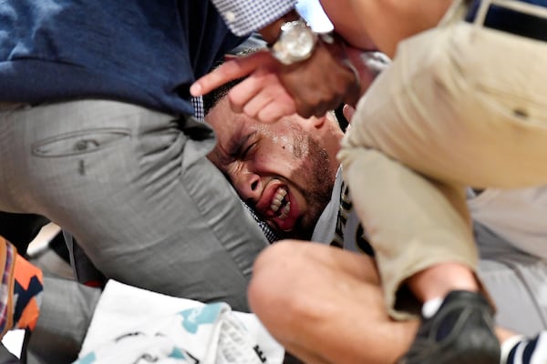 ATLANTA, GA - FEBRUARY 11: Jose Alvarado #10 of the Georgia Tech Yellow Jackets writhes in pain after taking a hard fall during the Yellow Jackets' basketball game against the Duke Blue Devils at Hank McCamish Pavilion on February 11, 2018 in Atlanta, Georgia. (Photo by Mike Comer/Getty Images)