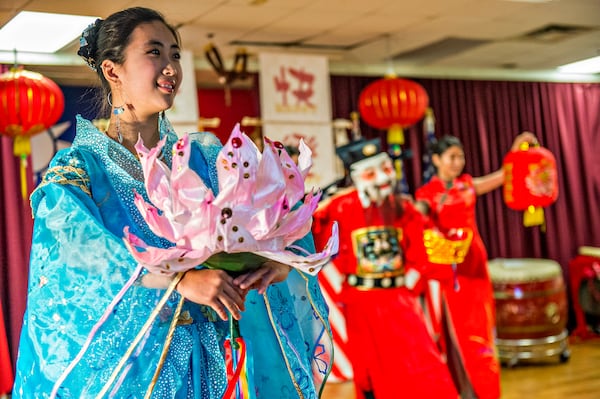 Ye Lu Yeu (left) performs on stage during the Atlanta Chinese Lunar New Year Festival in Chamblee on Saturday, February 13, 2016. Thousands of people came out to ring in the year of the monkey with food, performances and more. JONATHAN PHILLIPS / SPECIAL