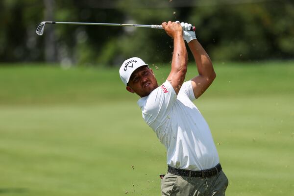 Xander Schauffele hits his second shot on the first fairway during the second round of the Tour Championship at East Lake Golf Club, on Friday, Aug. 30, 2024, in Atlanta. (Jason Getz / AJC)
