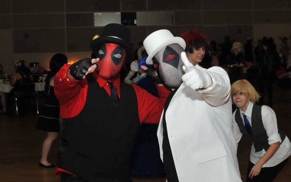 Two cosplayers strike a pose at a previous Momocon.