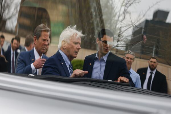 Gov. Brian Kemp, left, and Georgia Speaker of the House Jon Burns, center, have each warned fellow Republicans not to weaponize a new state commission against Fulton County District Attorney Fani Willis. (Natrice Miller/ Natrice.miller@ajc.com)